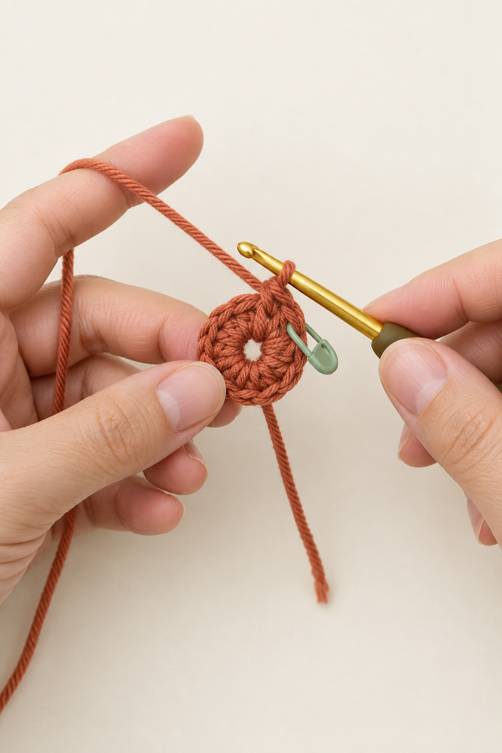 Six single crochet stitches worked into a terracotta magic ring